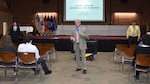 Defense Logistics Agency Installation Support at Richmond and Security and Emergency Services conducts Active Shooter Training April 13 – 14, 2016 in the Lotts Conference Center on Defense Supply Center Richmond, Virginia. The Active Shooter Program is conducted to prepare citizens to respond to a violent intruder at work, in school, or in a community environment, and to outline options to evade, hinder or stop an attacker. Pictured giving opening remarks is DLA Installation at Richmond’s Police Chief, Richard Milligan, center, and facilitators Criminal Intelligence Analyst Donald  Barker, left, and Installation Antiterrorism Officer Russel Pitts, right.