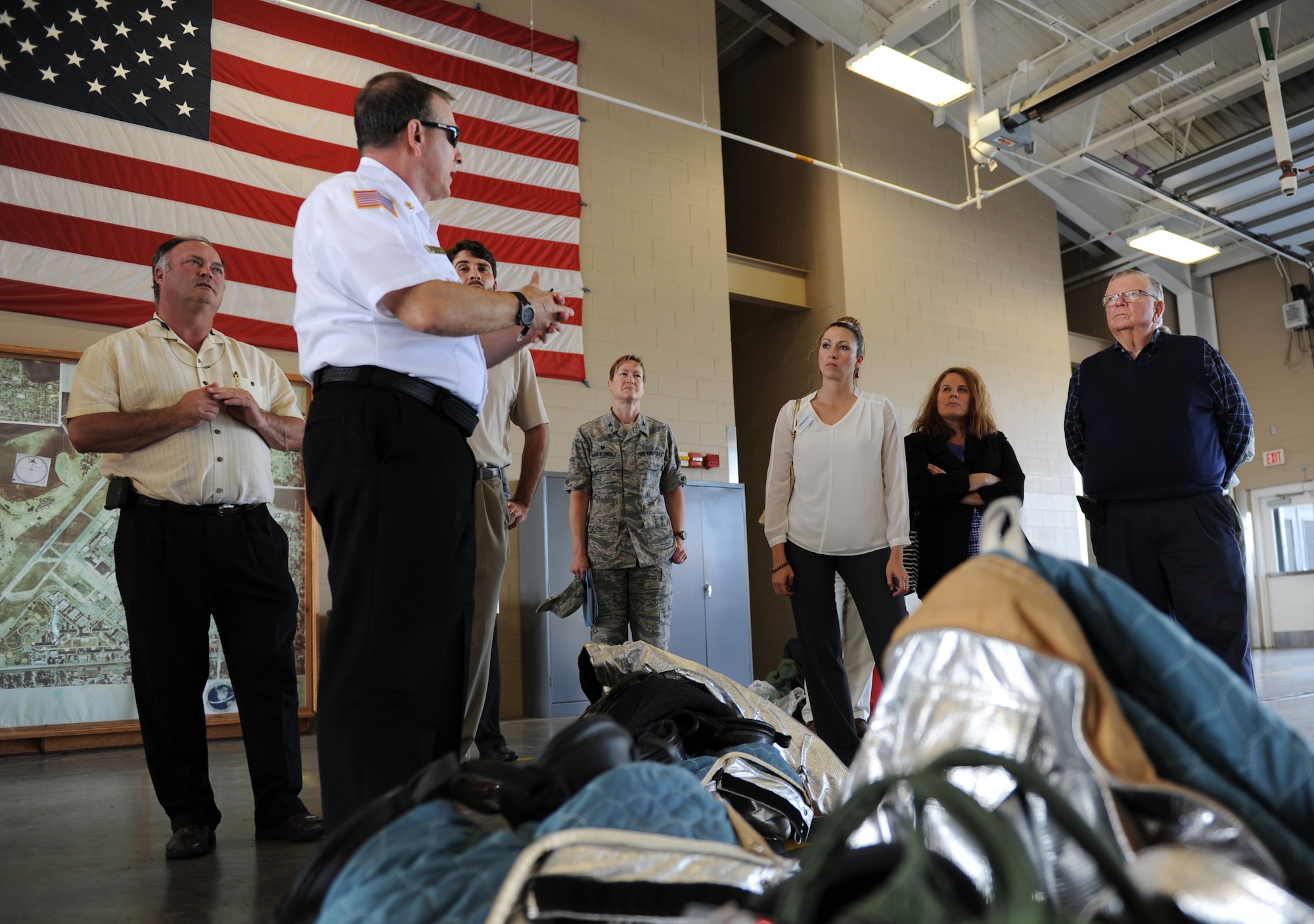 Chief James Donnett, 81st Infrastructure Division fire chief, provides a tour of the Keesler Fire Department during an honorary commanders 81st Mission Support Group orientation tour April 14, 2016, Keesler Air Force Base, Miss. The honorary commander program is a yearly partnership between base leadership and local civic leaders to promote strong ties between military and civilian leaders. (U.S. Air Force photo by Kemberly Groue)