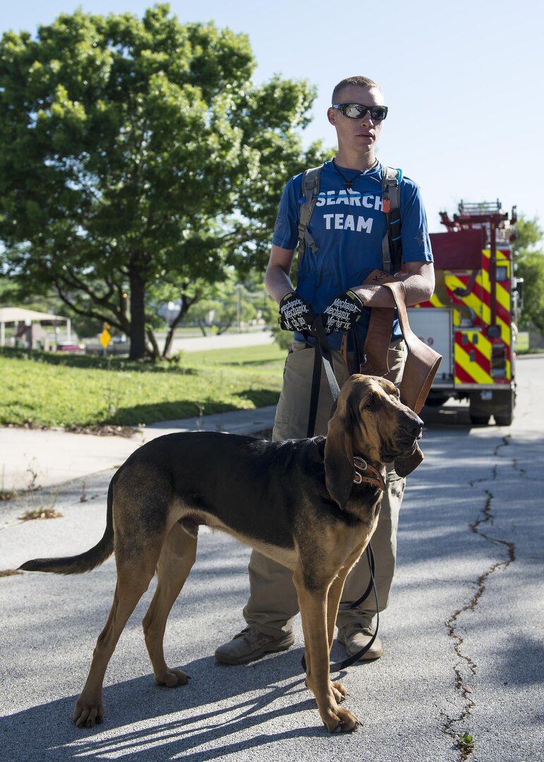 Wesley Willoughby, Alpha Search and Rescue trailing handler, and his dog Ehrlich Vormund prepare to hit a 24-hour trail during a training exercise at Joint Base San Antonio-Lackland Medina Annex April 2, 2016. A 24-hour trail consists of scents from the missing person that are up to 24 hours old. 