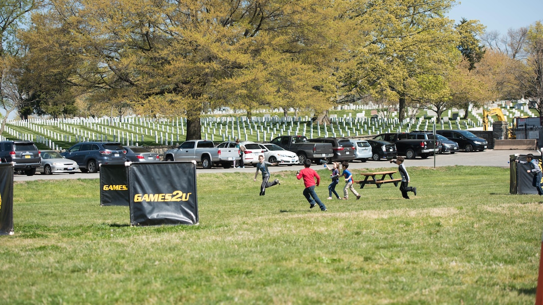 Several children play laser tag at the Children’s Fair at Henderson Hall in Arlington, Va. April 16, 2016. This was one of the events that got the kids to go outside and unplug from technology for a moment. (Photo by Lance Cpl. Timothy R. Smithers/ Released)