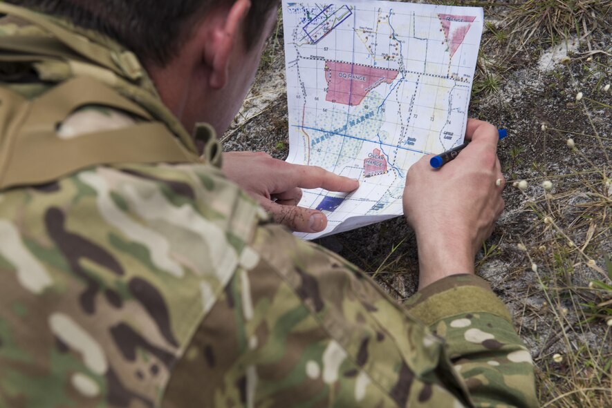 U.S. Air Force 1st Lt. Gregory Kloepfer, 20th Air Support Operations Squadron air liaison officer, targets coordinates during Spartan Warrior week, April 14, 2016, at Avon Park Air Force Range, Fla. As an ALO, Kloepfer is responsible for planning, coordinating, requesting and integrating joint fires. (U.S. Air Force photo by Airman 1st Class Greg Nash/Released)
