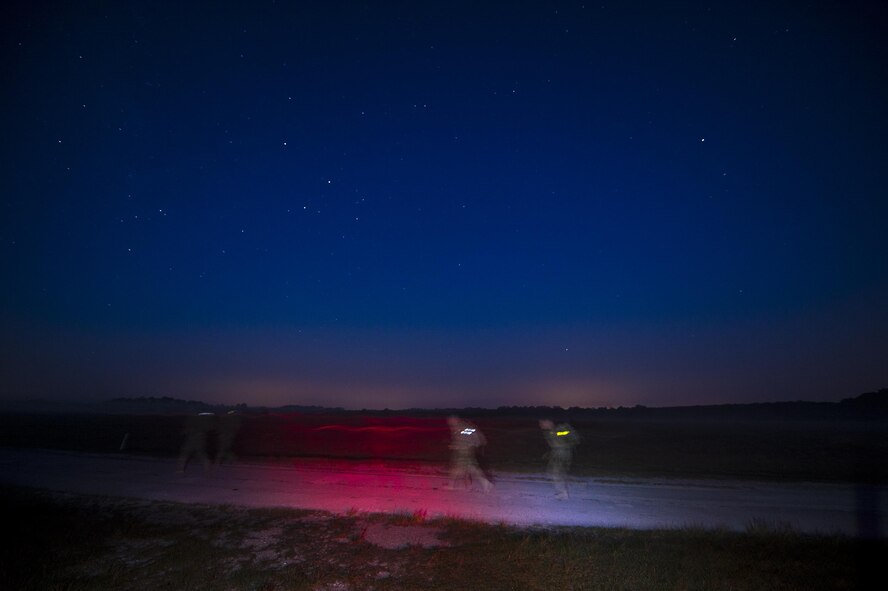 U.S. Air Force Airmen from the 93d Air Ground Operations Wing ruck-march during Spartan Warrior week, April 13, 2016, at Avon Park Air Force Range, Fla. Spartan Warrior is an annual combat readiness exercise hosted by the 93d AGOW which brings together battlefield Airmen from 20 geographically separated units. (U.S. Air Force photo by Senior Airman Ryan Callaghan/Released)
