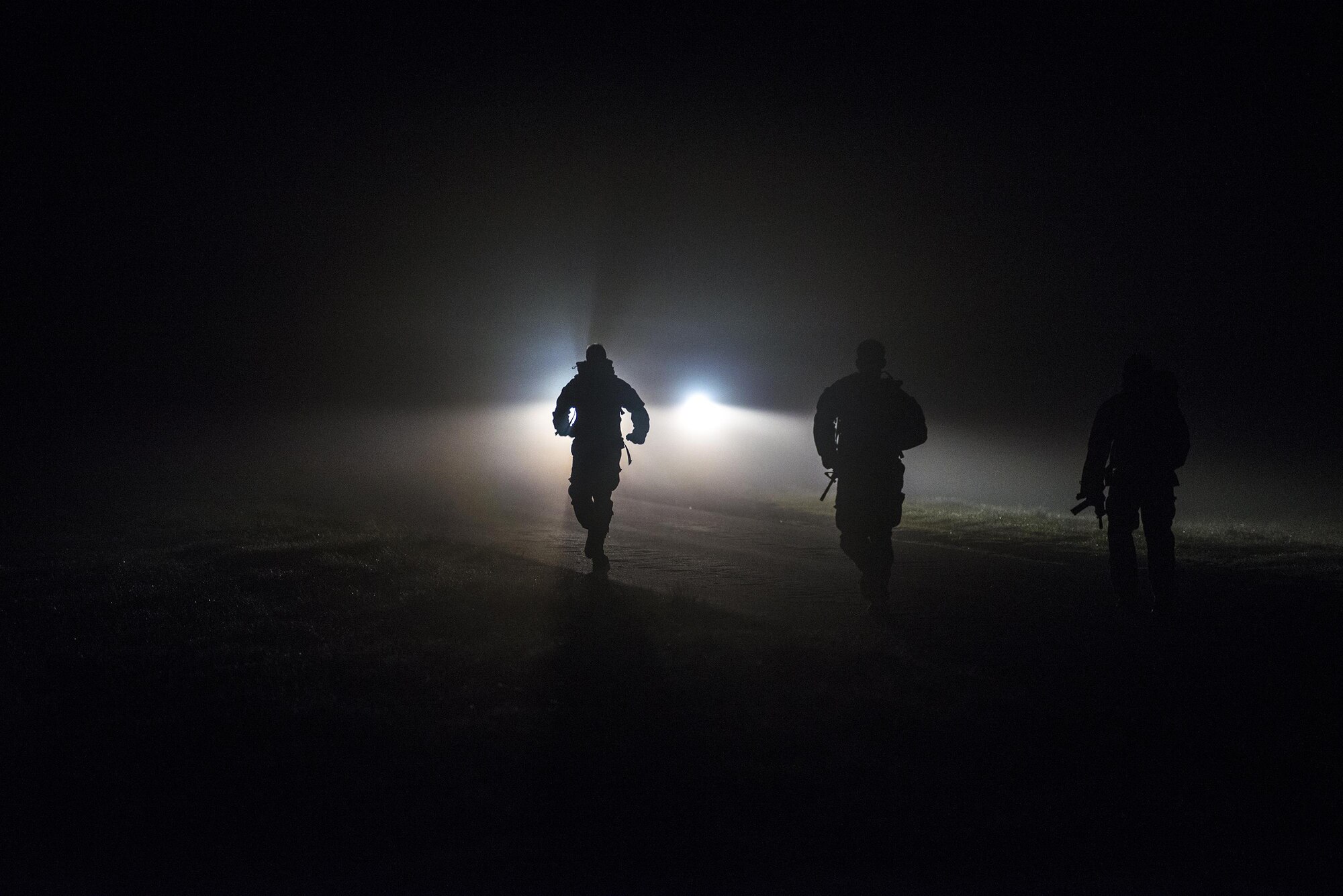 U.S. Air Force Airmen from the 93d Air Ground Operations Wing ruck-march during Spartan Warrior week, April 13, 2016, at Avon Park Air Force Range, Fla. Spartan Warrior is an annual combat readiness exercise hosted by the 93d AGOW which brings together battlefield Airmen from 20 geographically separated units (U.S. Air Force photo by Senior Airman Ryan Callaghan/Released)

