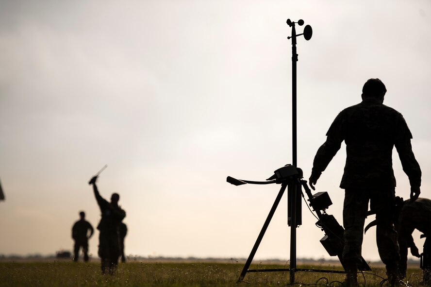 U.S. Air Force Airmen from the 18th Weather Squadron set up weather observation equipment during Spartan Warrior week, April 14, 2016, at Avon Park Air Force Range, Fla. Spartan Warrior is an annual combat readiness exercise hosted by the 93d AGOW which brings together battlefield Airmen from 20 geographically separated units (U.S. Air Force photo by Senior Airman Ryan Callaghan/Released)
