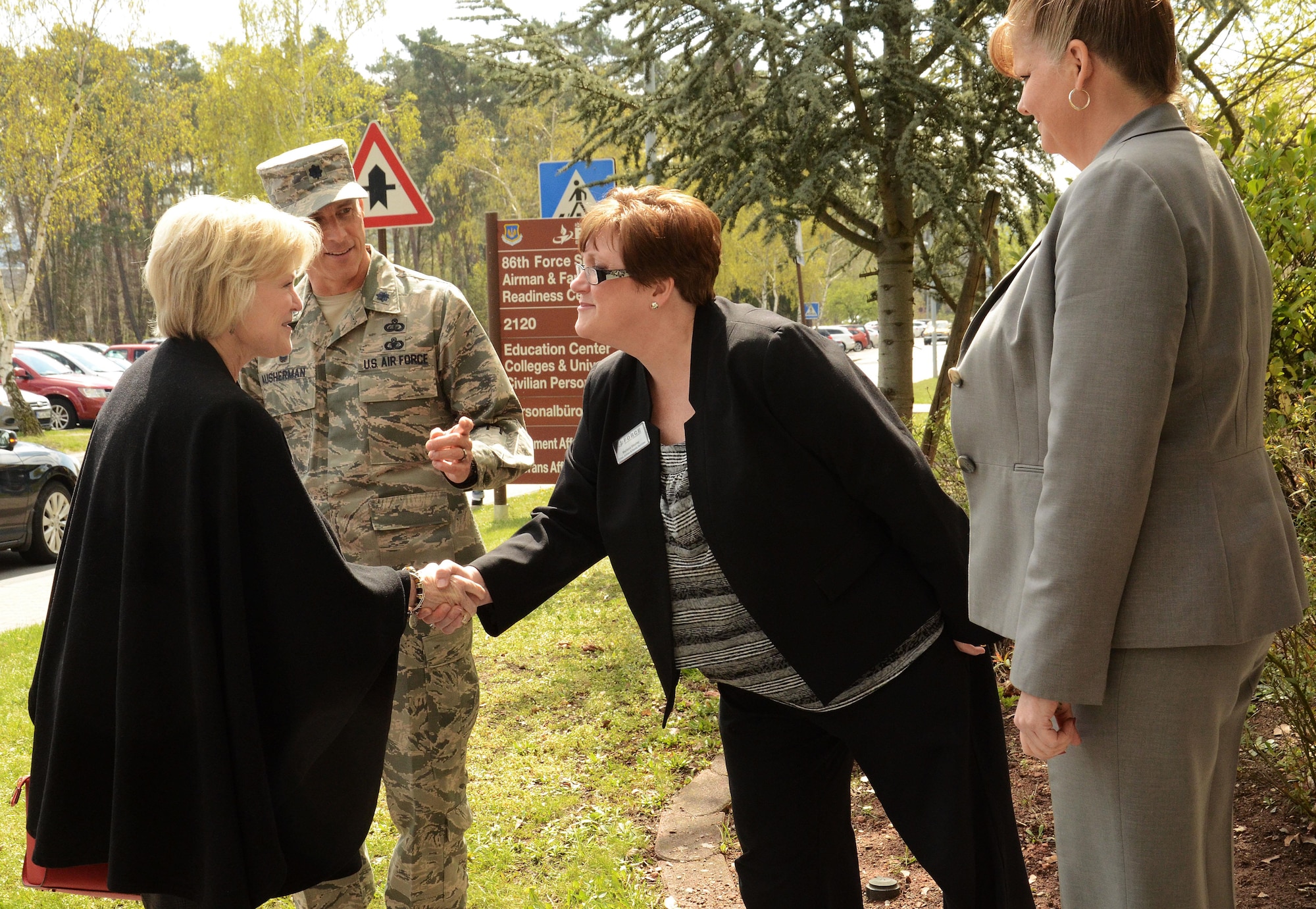 Dawn Goldfein, wife of Air Force Vice Chief of Staff Gen. David L. Goldfein, is greeted by Lt. Col. Thomas Ausherman, the 86th Force Support Squadron commander, and members from the Ramstein Airman and Family Readiness Center at Ramstein Air Base, Germany, April 18, 2016. Dawn had the opportunity to meet with other spouses on base and several dependents who were part of the ordered departure from Turkey in late March. (U.S. Air Force photo/Master Sgt. Amanda Callahan)