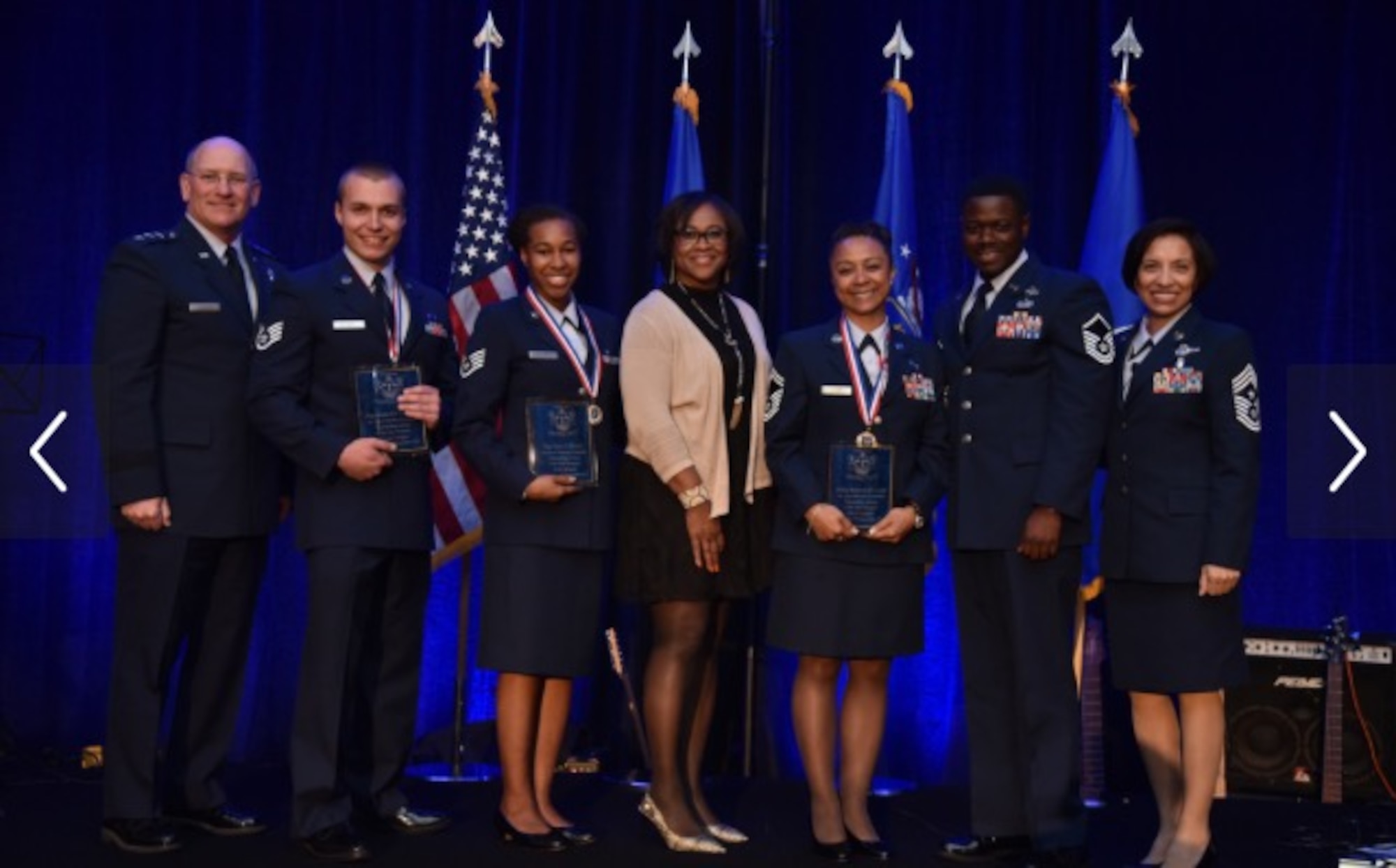 Staff Sgt. Mitchell Ciccarelli, Air Reserve Personnel Center casualty service technician, stands among leadership and other recipients during the Air Force Reserve Command Outstanding Airmen of the Year Banquet April 16, 2016, held in Jacksonville, Fla. Ciccarelli was presented the 2015 Headquarters AFRC Airman of the Year award by Lt. Gen. James F. Jackson, chief of the Air Force Reserve and commander of AFRC. (Air Force courtesy photo)