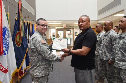 Col. Robert Spinell, left, and Mr. Lynn Barden pause for a photo during Barden's retirement ceremony. During the ceremony Barden received a Superior Civilian Service Award.
(Photo by Sgt. 1st Class Anthony L. Taylor)