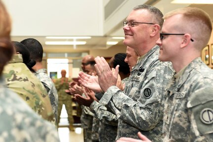 Members of the 85th Support Command applaud during Mr. Lynn Barden's, G3, farewell ceremony.
(Photo by Sgt. 1st Class Anthony L. Taylor)