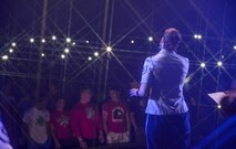 U.S. Air Force Tech. Sgt. Rebecca Packard, vocalist with the United States Heartland of America Band, sings Don’t Stop Believing by Journey to students during a concert at Aurora Public Schools on April 13, 2016 in Aurora Neb. The members of Raptor bring to the Air Force many years of professional experience with symphony orchestras, chamber ensembles, touring shows, and from singing songs from today’s popular artists. (U.S. Air Force photo by Zachary Hada)