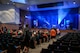 Middle and high school students from Aurora Public Schools assemble in their school auditorium to watch a performance by members of Raptor, an ensemble of the U.S. Air Force Heartland of America Band April 13, 2016, in Aurora, Neb. The Heartland of America Band is a group of Air Force professional musicians whose backgrounds include advanced degrees in music performance and whose broad mastery of musical styles range from classic to contemporary, jazz to country and pop to rock. (U.S. Air Force photo by Zachary Hada)
