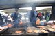 U.S Air Force Airman 1st Class Dylan and Staff Sgt. Eddie Guillory, 355th Logistics Readiness Squadron DM50 volunteers, grill hamburgers and hotdogs during the annual DM50 Picnic at Davis-Monthan Air Force Base, Ariz., April 16, 2016. The picnic provided all D-M AFB Airmen, civilians and families with free food, entertainment, and activities. (U.S. Air Force photo by Airman Nathan H. Barbour/Released)