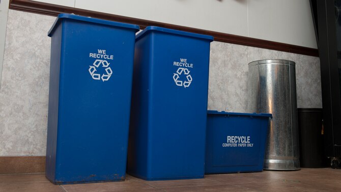Recycling containers sit inside a breakroom April 18, 2016, at the 9th Airlift Squadron on Dover Air Force Base, Del. All facilities on base have recycling bins. (U.S. Air Force photo/Senior Airman Zachary Cacicia)