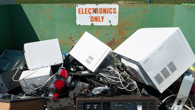 A dumpster of recyclable electronics sits at the Dover Air Force Base Recycling Center April 18, 2016, on Dover Air Force Base. Electronics, such as old keyboards, monitors and microwaves can be recycled. (U.S. Air Force photo/Senior Airman Zachary Cacicia)
