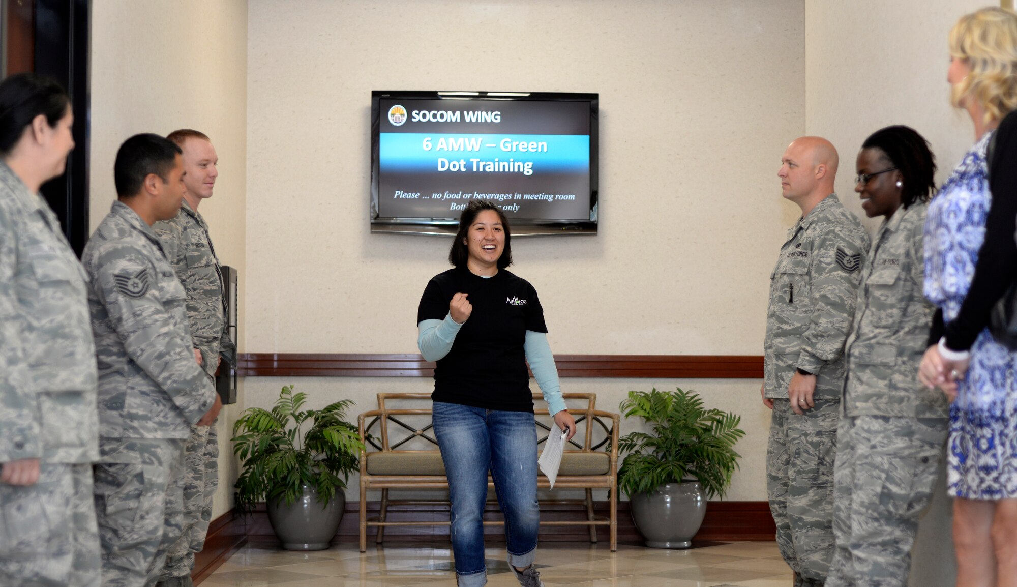 Airman 1st Class Ashley Adkins, a Green Dot representative assigned to the 6th Air Mobility Wing, facilitates an icebreaker exercise for students during a Green Dot Early Adopters course at MacDill Air Force Base, Fla., April 19, 2016. The Green Dot program focuses on the prevention of power-based interpersonal violence, which includes not only sexual violence, but also domestic violence, dating violence, stalking, child abuse, elder abuse, and bullying. (U.S. Air Force photo by Tech. Sgt. Krystie Martinez)