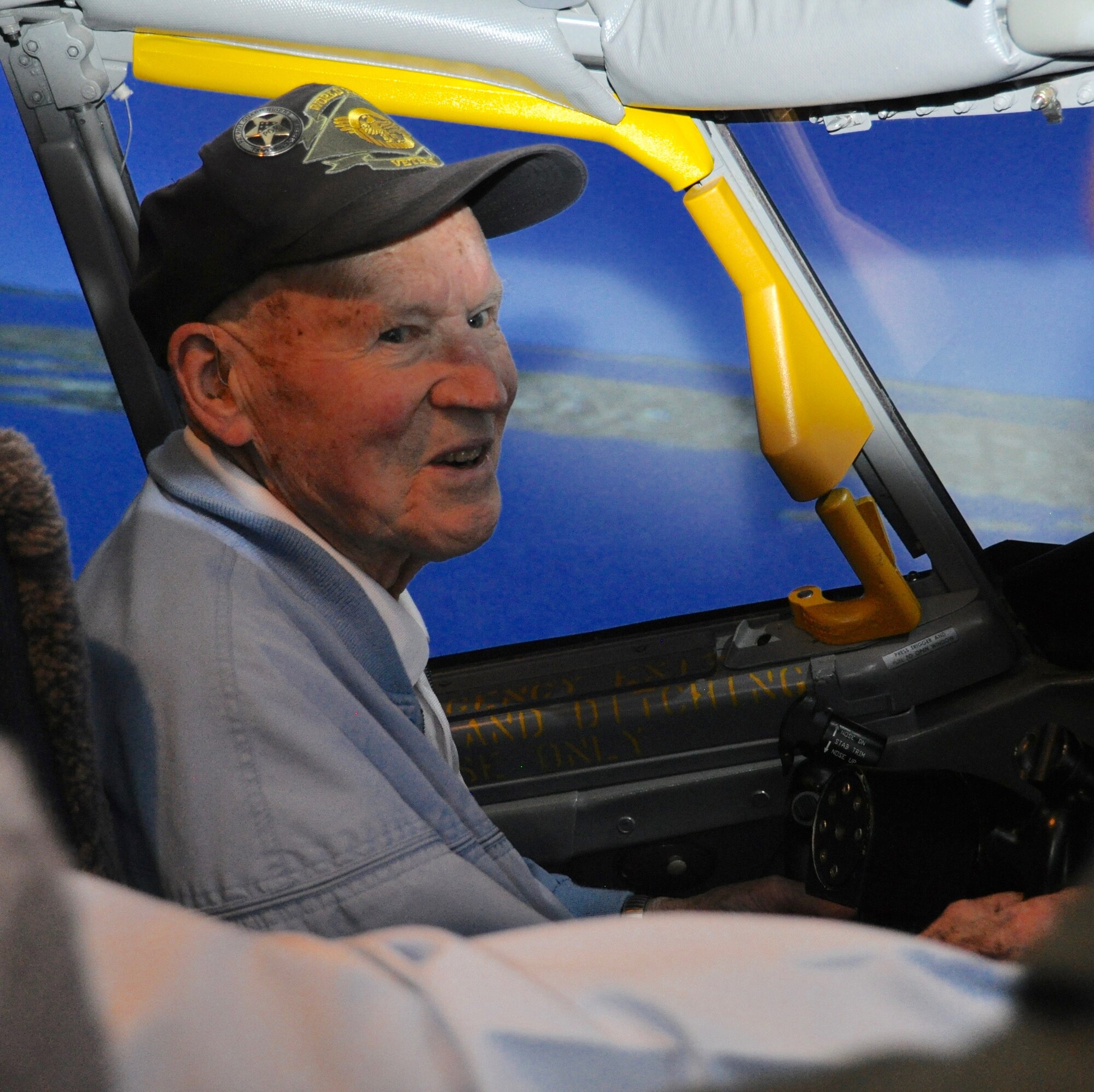 Staff Sgt. David Thatcher recounts his experience as a Doolittle Raider in a KC-135 flight simulator April 18, 2016, at Fairchild Air Force Base, Wash. Thatcher was the engineer-gunner of Aircraft No. 7, “The Ruptured Duck,” one of 16 B-25 Mitchell aircraft that raided Tokyo April 18, 1942. (U.S. Air Force photo/2nd Lt. Shelley Gregory)