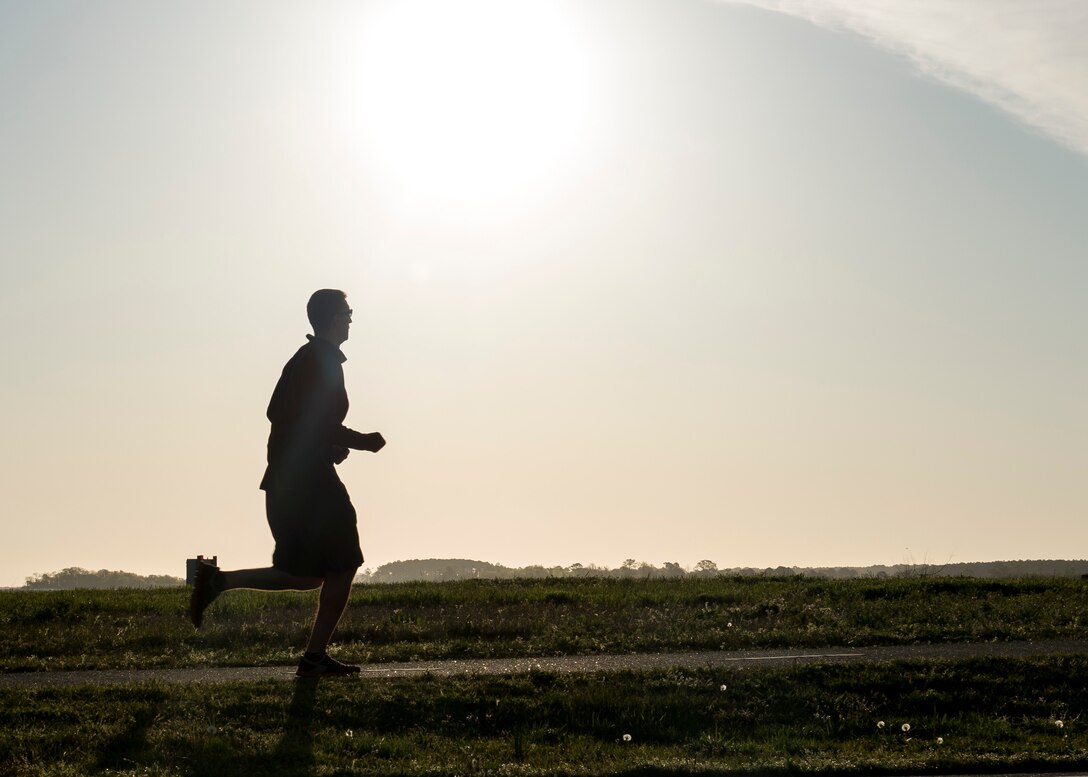A runner participates in the second annual Sexual Assault Prevention and Response Program Awareness 5K run at Langley Air Force Base, Va., April 15, 2016. The SAPR program provided resources to victims of sexual assault who are in need of care, support and different reporting options such as restricted and unrestricted. (U.S. Air Force photo by Airman 1st Class Derek Seifert)