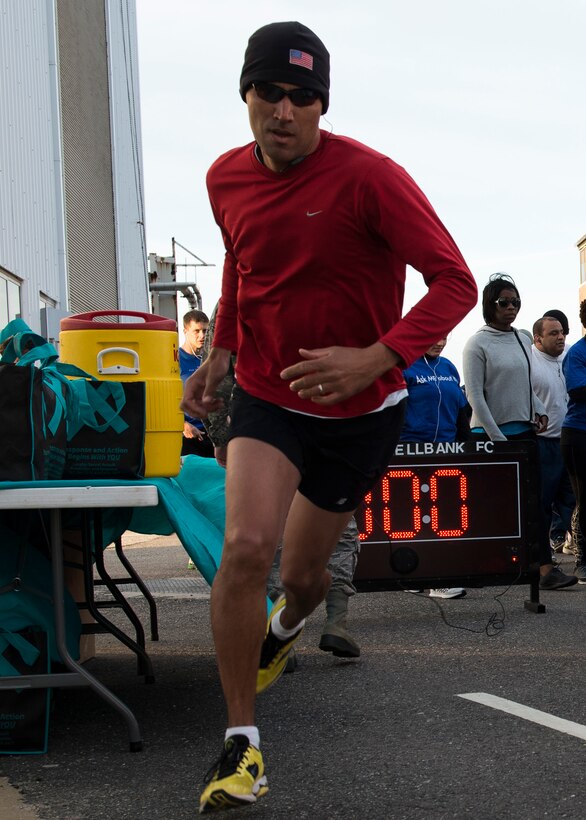 A runner starts the second annual Sexual Assault Prevention and Response Program (SAPR) 5K run at Langley Air Force Base, Va., April 15, 2016. The SAPR 5K run brought U.S. Service members together to show support for victims of sexual assault during Sexual Assault Awareness Month. (U.S. Air Force photo by Airman 1st Class Derek Seifert)