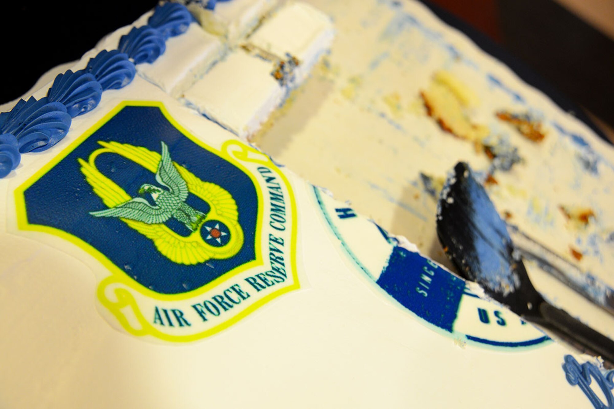 The Air Force Reserve 68th birthday celebration provides cake for participants to enjoy at Joint Base Elmendorf-Richardson, Alaska, April 14, 2016. The theme was “Stationed Locally, Serving Globally” in honor of more than 69,000 citizen Airmen stationed in more than 66 communities throughout the United States and overseas. Citizen Airmen serve globally in every combatant command in air, space and cyberspace. (U.S. Air Force photo by Airman 1st Class Christopher R. Morales)