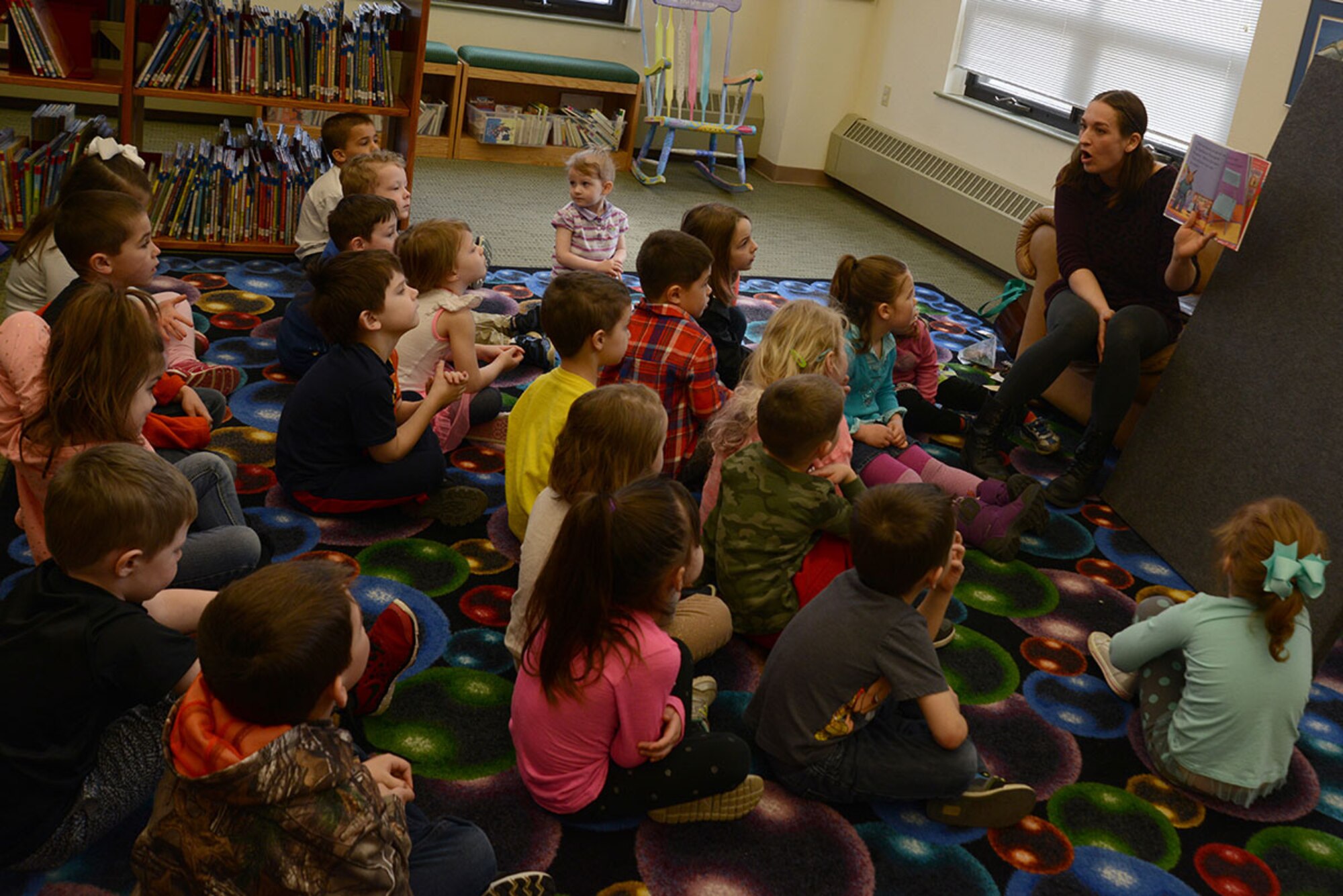 The Joint Base Elmendorf-Richardson Consolidated Library story time has library themed books like “The Library Lion,” “Bats in the Library,” “Froggy Goes to the Library” and more for National Library Week at JBER, Alaska, April 12, 2016. Story time is every Tuesday, Wednesday and Thursday from 10 to 11 a.m. for preschoolers and provides short stories, singing and crafts. (U.S. Air Force photo by Airman 1st Class Christopher R. Morales)