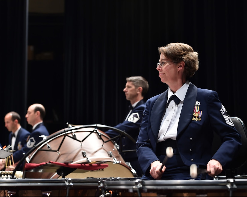 Chief Master Sgt. Erica Montgomery, U.S. Air Force Concert Band principal timpanist, performs during a Concert Band and Singing Sergeants performance at Harding University, in Searcy, Ark., April 8, 2016. The bands performed across five states during a 12 day spring tour. (U.S. Air Force photo by Senior Airman Dylan Nuckolls/Released)