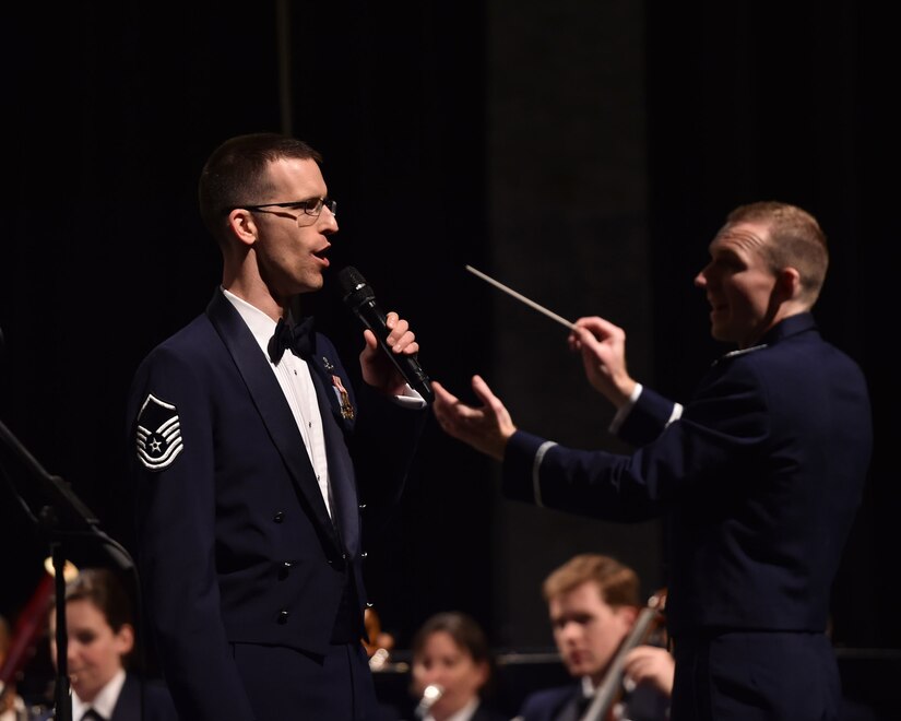 Master Sgt. Matthew Irish, U.S. Air Force Singing Sergeants baritone vocalist, sings during a Concert Band and Singing Sergeants performance at University Louisiana-Monroe, in Monroe, La., April 11, 2016. The bands performed across five states during a 12 day spring tour. (U.S. Air Force photo by Senior Airman Dylan Nuckolls/Released)