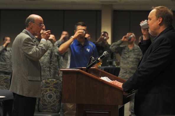 Jeff Thatcher, Children of the Doolittle Raiders president and son of Staff Sgt. David Thatcher, raises his glass to toast the Doolittle Raiders April 18, 2016, at Little Rock Air Force Base, Ark. The Doolittle Raiders consisted of 80 Army Air Corps members who volunteered to make the first United States assault on the Japanese after the attack on Pearl Harbor. (U.S. Air Force photo by Airman 1st Class Mercedes Taylor) 