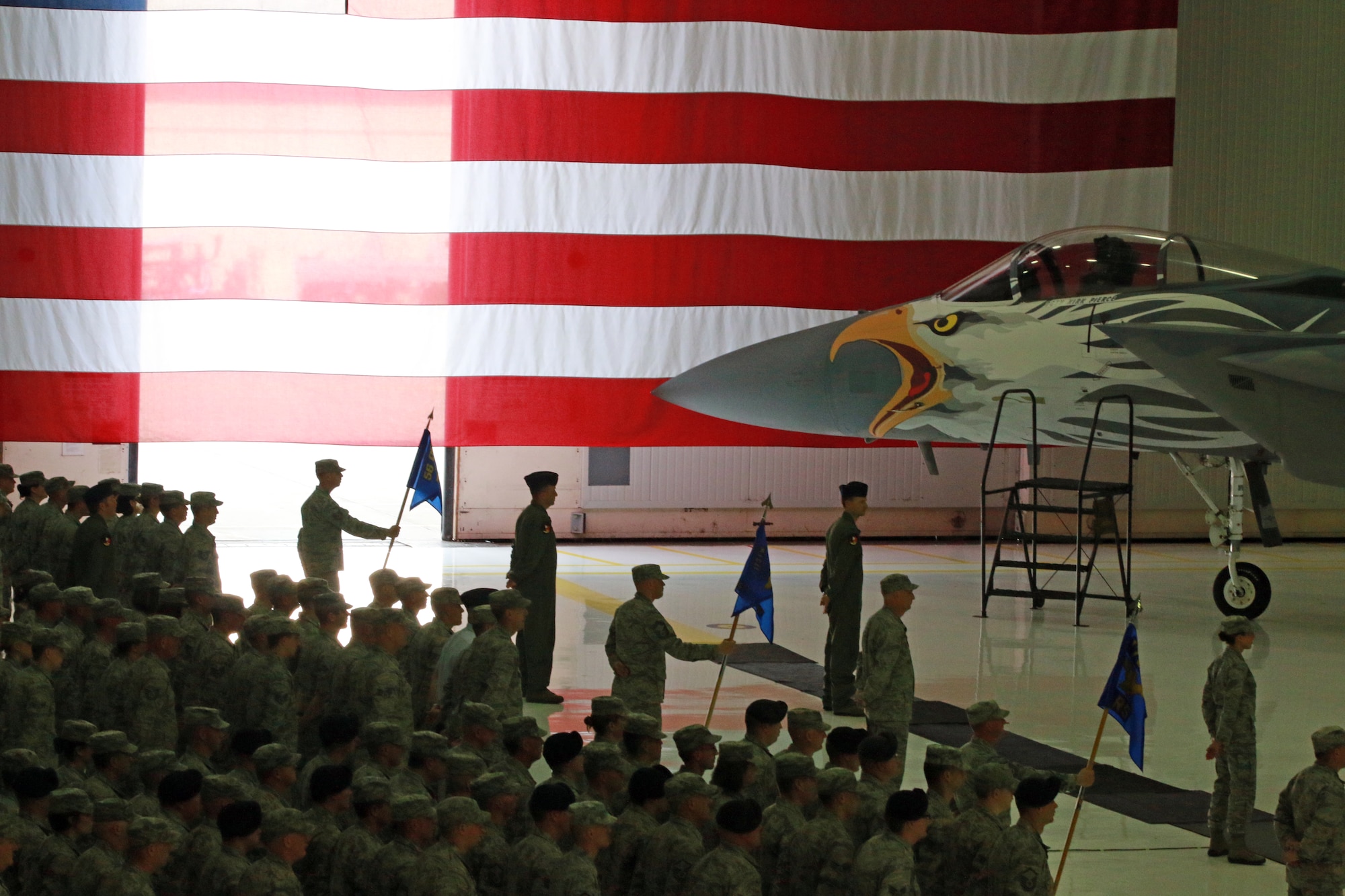 Airmen of the 173rd Fighter Wing stand at parade rest during a change of command ceremony in which Col. Jeffrey Smith accepted the helm from Brig. Gen. Kirk Piercewho was promoted in an earlier ceremony. (U.S. Air National Guard photo by Tech. Sgt. Jefferson Thompson/released)