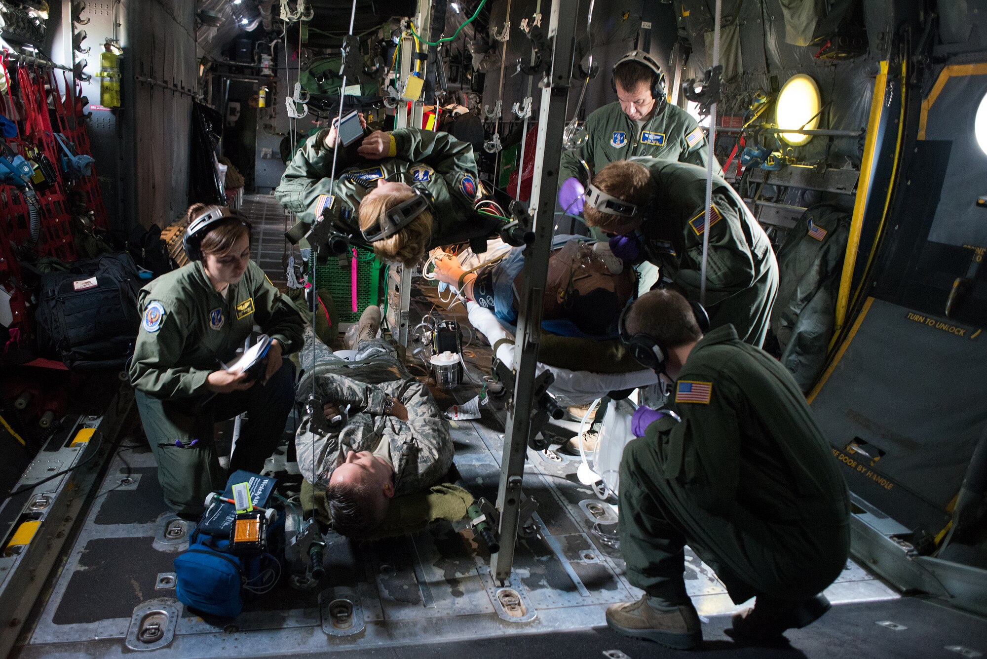 Airmen from a variety of Aeromedical Evacuation Squadrons attend to simulated medical challenges as part of the Multiple Aircraft Training Opportunity Program training event held at Will Rogers Air National Guard Base, Oklahoma City, April 15-16, 2016. The 137th Aeromedical Evacuation Squadron hosted five other aeromedical squadrons at the two day event. (U.S. Air National Guard photo by Master Sgt. Andrew LaMoreaux/Released)
