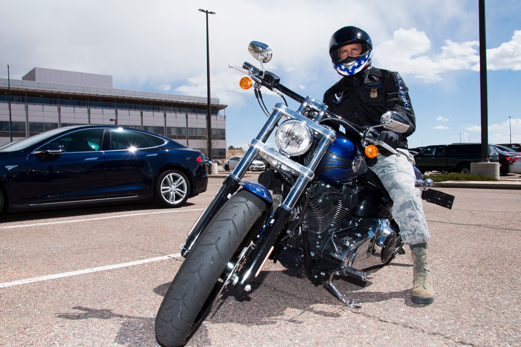 Chief Master Sgt. John Bentivegna, 50th Space Wing command chief, encourages Airmen at Schriever Air Force Base, Colorado, to ride safely and take advantage of the free motorcycle safety courses. The Air Force requires its motorcyclists to receive an initial motorcycle safety course followed by a refresher course once every five years. (U.S. Air Force photo/Tech. Sgt. Julius Delos-Reyes)