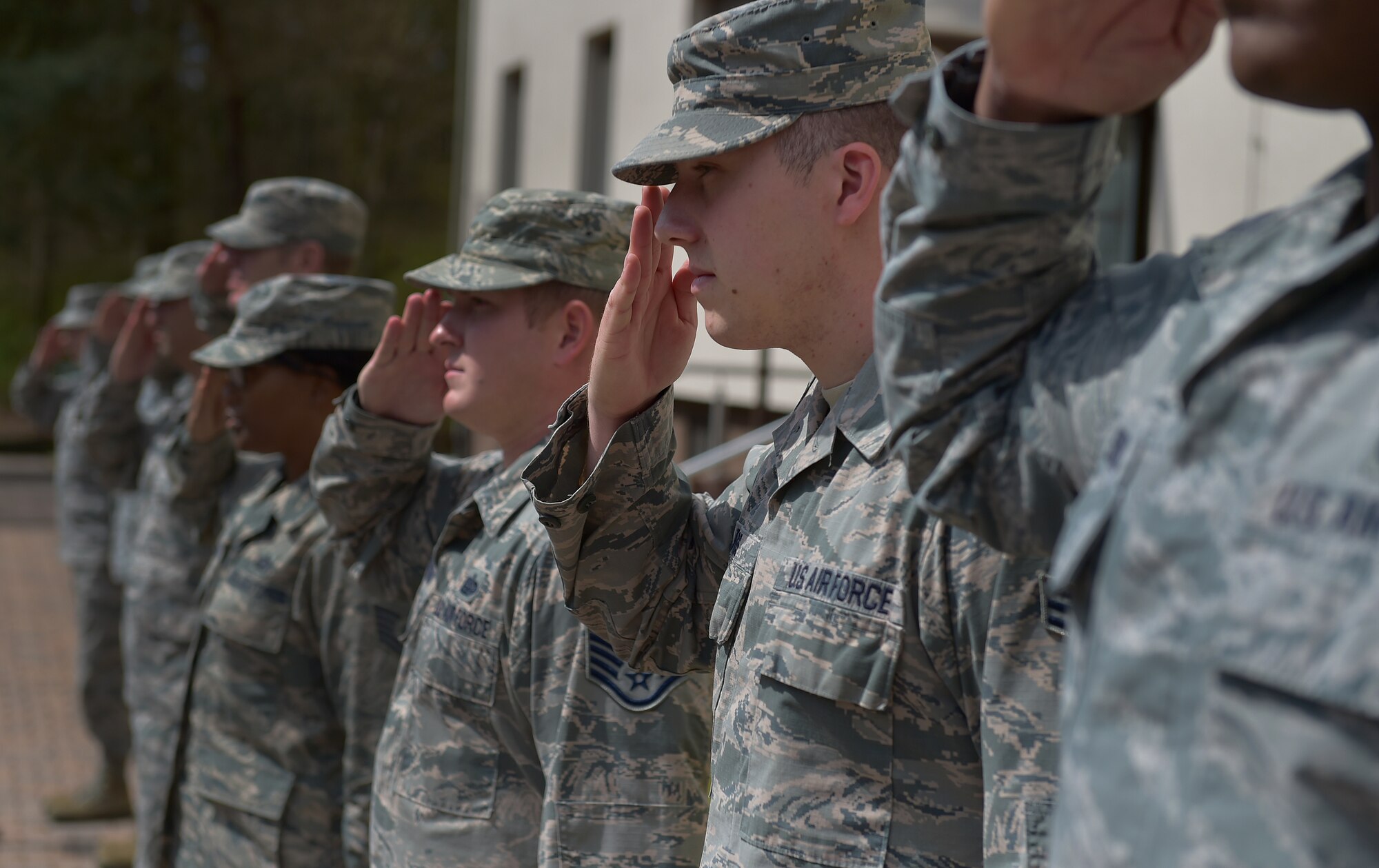 U.S. Air Force Airmen greet Vice Chief of Staff Gen. David L. Goldfein at the Deployment Transition Center here at Ramstein Air Base, Germany, 18 April 2016.  Goldfein visited the DTC, along with other organizations on Ramstein, to gain insight into their operation and how critical it is to ensuring redeployers from combat areas of responsibility are cared for appropriately. The DTC functions as an en route transition point for redeployers where they receive centralized training to help them reintegrate and decompress before heading back to their home station. The training is facilitated by both members of their career field and medical staff. (U.S. Air Force photo/1st Lt. Clay Lancaster)