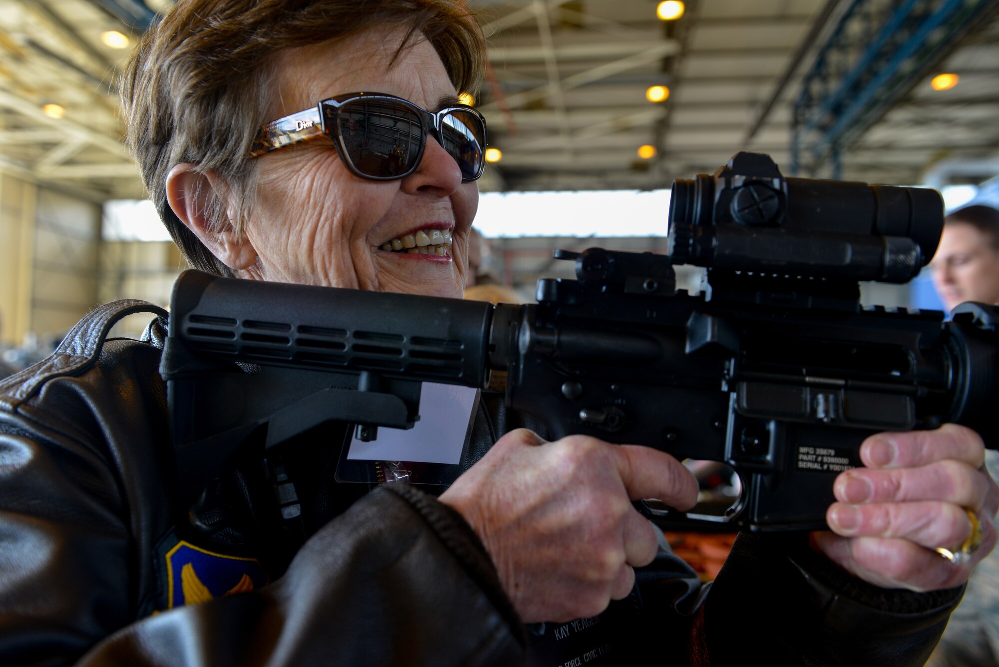 Kay Yeagar, Air Force Chief of Staff Civic Leaders Program member, holds an M-4 rifle during a presentation by the 435th Security Forces Squadron April 18, 2016, at Ramstein Air Base, Germany.  The Air Force CSAF Civic Leader’s mission is a liaison program for military members to relay information back to the American public in support of the Air Force.  The group is comprised of a variety of members from Guam to the continental U.S. with a variety of different backgrounds. (U.S. Air Force photo/Senior Airman Nicole Keim)