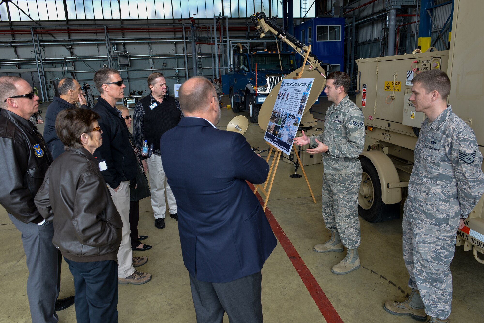 Airmen from the 1st Combat Communications Squadron explain their role in the mission during the Air Force Chief of Staff Civic Leader Program tour April 18, 2016 at Ramstein Air Base, Germany.  Airmen assigned to the 86th Airlift Wing and 435th Air Ground Operations Wing hosted the civic leaders to provide firsthand knowledge of their mission. The Air Force CSAF Civic Leader’s mission is a liaison program for military members to relay information back to the American public in support of the Air Force. (U.S. Air Force photo/Senior Airman Nicole Keim) 