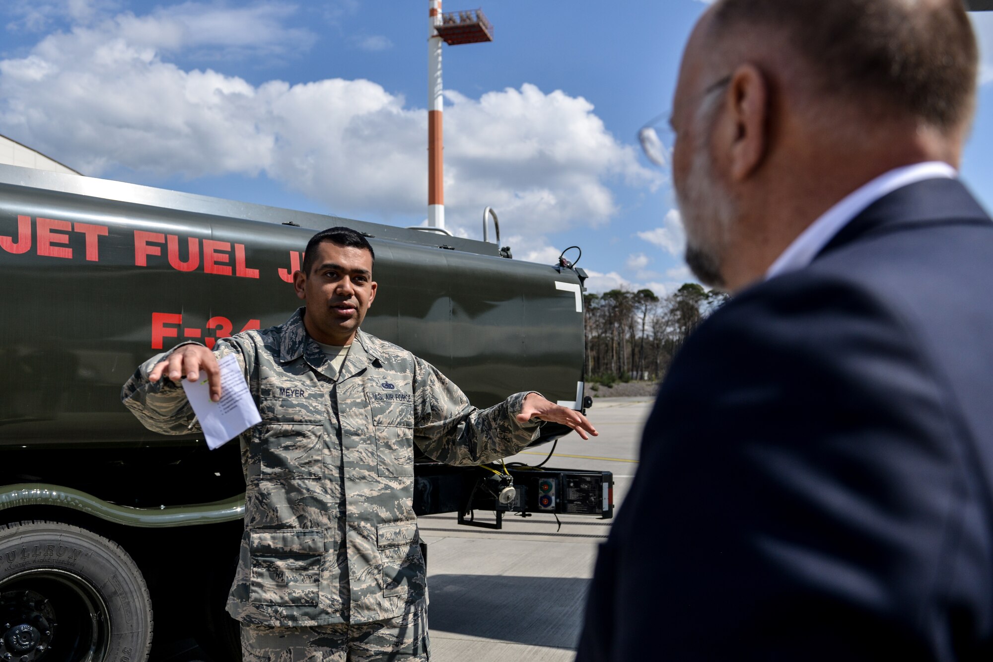 Tech. Sgt. Daniel Meyer, 86th Logistics Readiness Squadron NCO in charge of fuels support, speaks to Air Force Chief of Staff Civic Leaders April 18, 2016 at Ramstein Air Base, Germany.  Meyer and many other Airmen from Team Ramstein demonstrated their role to illustrate the importance of their unit’s efforts toward the mission. The goal of the CSAF Civic Leader Program is to find ways to better support the Air Force and Airman and their families. (U.S. Air Force photo/Senior Airman Nicole Keim)