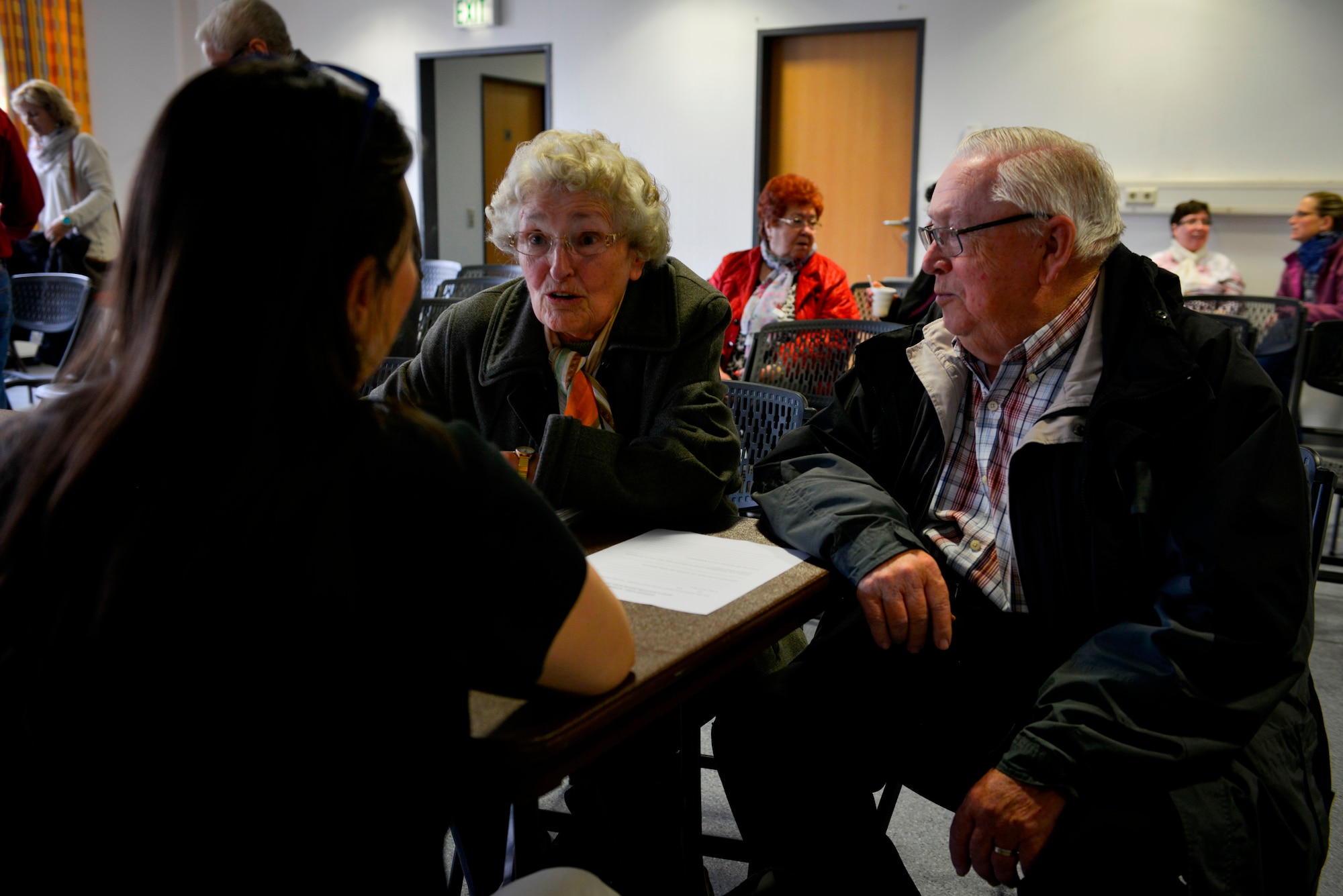 A couple receives advice at the Surviving Spouses workshop Aril 16, 2016, at Ramstein Air Base, Germany.  The Kaiserslautern Military Community Retiree Counsel hosted the first workshop to inform spouses and retired service members of the benefits they are entitled to after a retiree or service member passes away, and what paperwork will be required of them. (U.S. Air Force photo/Senior Airman Nicole Keim)