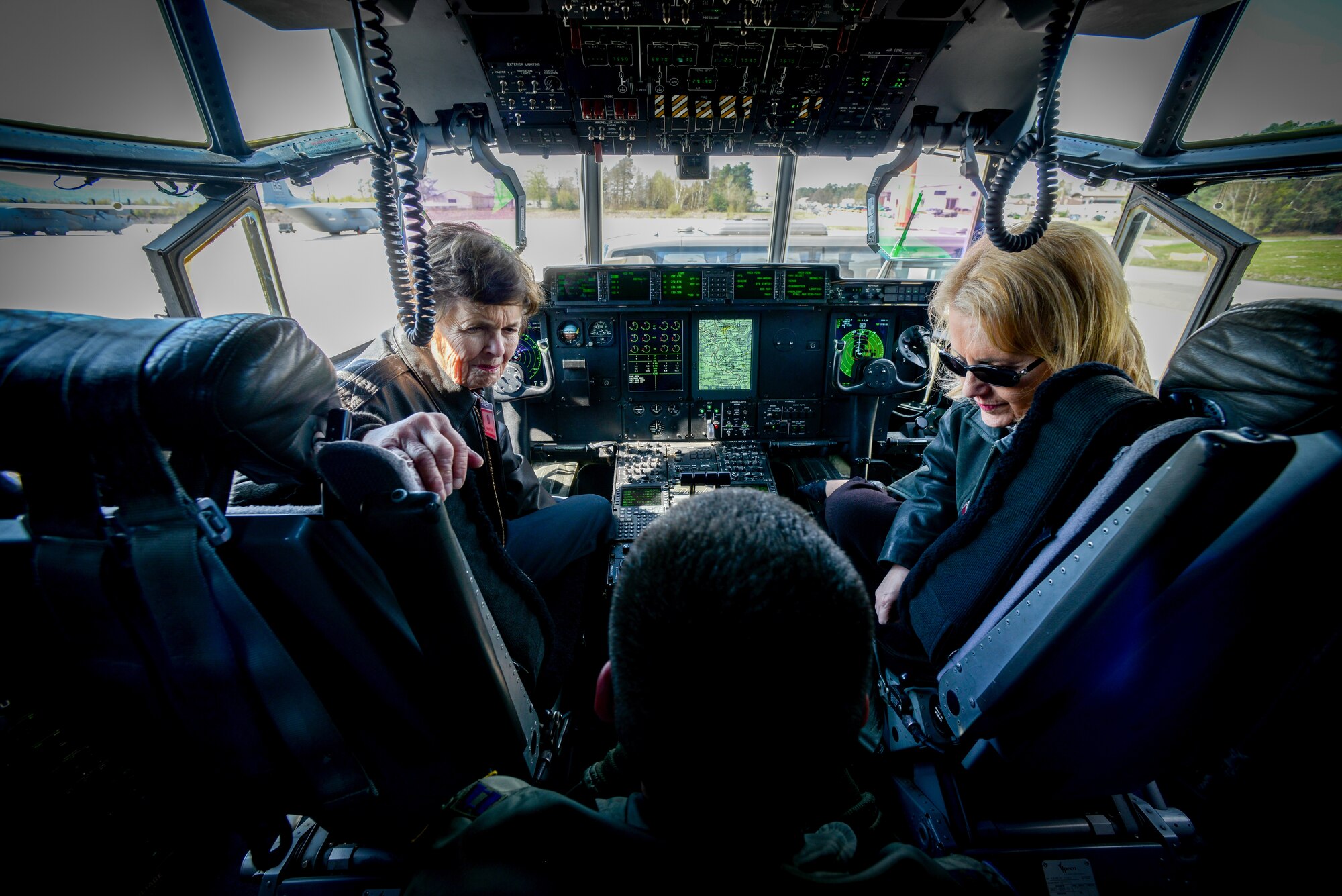 Air Force Chief of Staff Civic Leaders Program members sit in the cockpit of a C-130J Super Hercules April 18, 2016, at Ramstein Air Base, Germany. The CSAF Civic Leader’s mission is a liaison program for military members to relay information back to the American public in support of the Air Force. The group is comprised of a variety of members from Guam to the continental U.S. with a variety of different backgrounds, with one common passion of service to Airman and their families. (U.S. Air Force photo/Senior Airman Nicole Keim) 