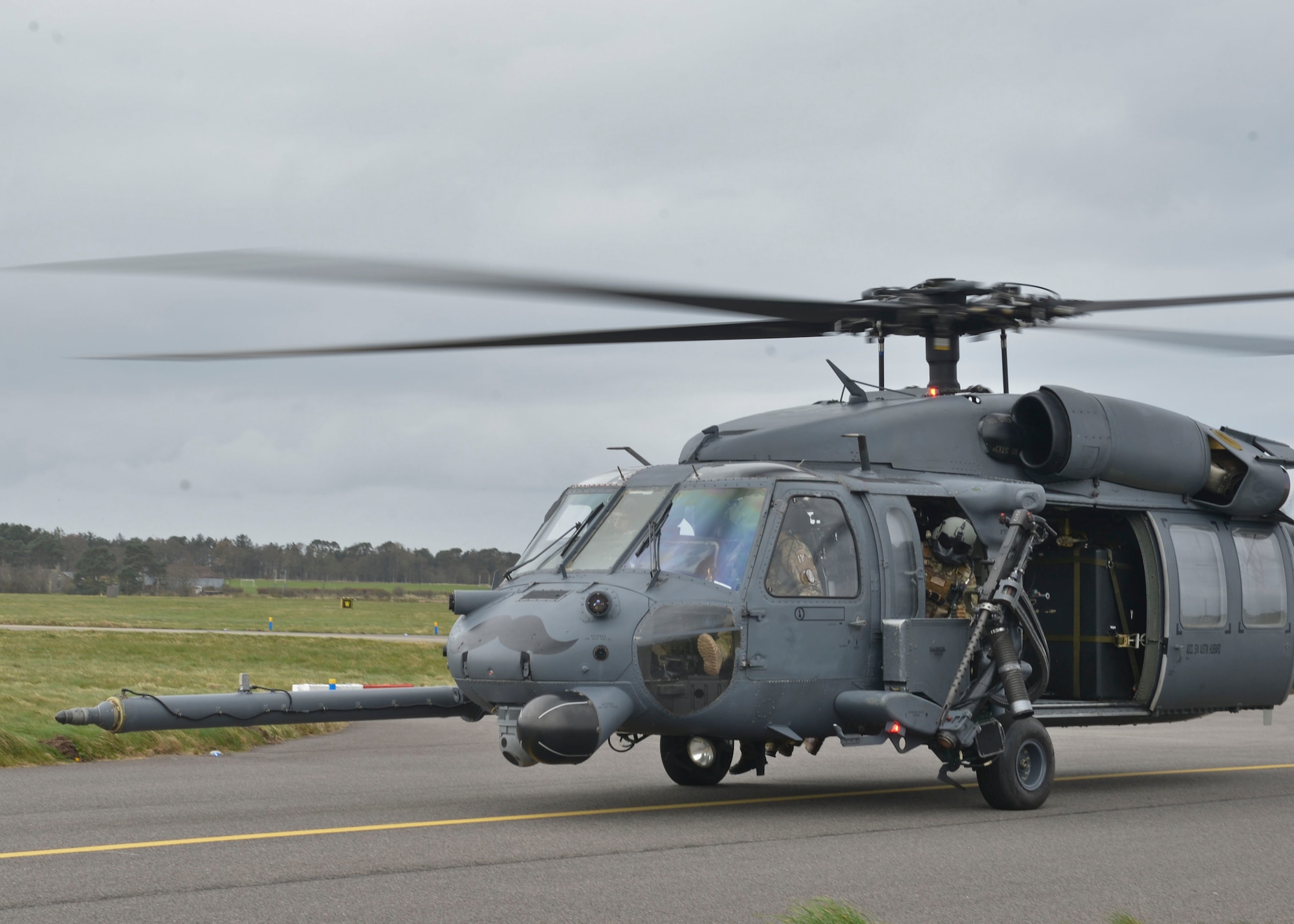 A HH-60G Pave Hawk taxis the runway during Joint Warrior 2016 at Royal Air Force Lossiemouth, Scotland, April 13, 2016. Joint Warrior is a three-week multi-nation exercise catered to enhancing the capabilities of its personnel for real-world events through various forms of training including air-to-ground combat. (U.S. Air Force photo/Senior Airman Nigel Sandridge)