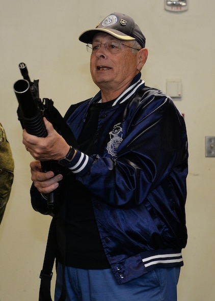 Retired Senior Master Sgt. William “Pete” Piazza, a former Air Force Security Forces member, visits with members of the 91st Security Forces Group during a visit to Minot Air Force Base, N.D., April 5, 2016. Sergeant Piazza’s visit was one of encouragement to the men and women of Minot AFB and to personally thank them for the sacrifices made every day in the defense of this nation. (U.S. Air Force photo/Airman 1st Class Matt Rauschnot)