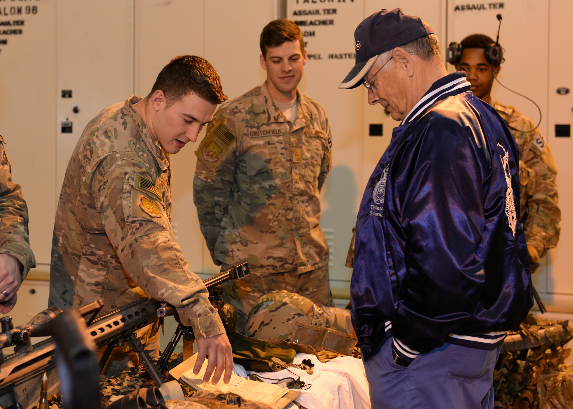 Retired Senior Master Sgt. William “Pete” Piazza, a former Air Force Security Forces member, visits with members 791st Missile Security Forces Squadron tactical response force members during a visit to Minot Air Force Base, N.D., April 5, 2016. Sergeant Piazza’s visit was one of encouragement to the men and women of Minot AFB and to personally thank them for the sacrifices made every day in the defense of this nation. (U.S. Air Force photo/Airman 1st Class Matt Rauschnot) 