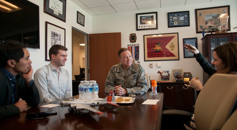 Maj. Gen. Darryl W. Burke, Air Force District of Washington commander, sits with the family of deceased Lt. Gen. Frank M. Andrews, of whom the base is named after, during their visit to Joint Base Andrews, Md., April 14, 2016. The Andrews family visited JBA to learn about the history of the base and of their great-great uncle. (U.S. Air Force photo by Airman Gabrielle Spalding/Released)