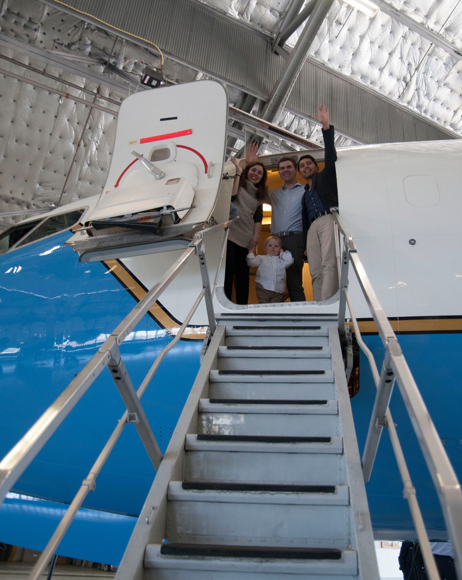 Family of deceased Lt. Gen. Frank M. Andrews, of whom the base is named after, pose for photos during their tour of a C-40B/C aircraft at Joint Base Andrews, Md., April 14, 2016. The Andrews family came to JBA to learn about the history of the base and its present mission. (U.S. Air Force photo by Airman Gabrielle Spalding/Released) 