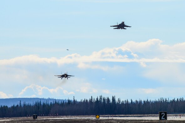 Indian Air Force Su-30MKI fighter aircraft prepare to land at Eielson Air Force Base, Alaska, April 16, 2016. Indian Air Force airmen arrived at Eielson in preparation for RED FLAG-Alaska (RF-A) 16-1. RF-A is a series of Pacific Air Forces commander-directed field training exercises for U.S. and partner nation forces, providing combined offensive counter-air, interdiction, close air support and large force employment training in a simulated combat environment. (U.S. Air Force photo by Staff Sgt. Joshua Turner/Released)