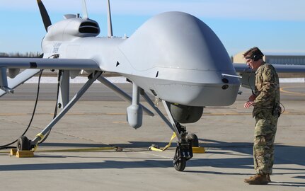 Spc. Devin Pisani, an Unmanned Aerial System Maintainer, with Delta Company, 25th Aviation inspects the airframe of an MQ-1C Gray Eagle before take-off April 12, 2016 at Fort Wainwright, Alaska’s Ladd Army Airfield. The Gray Eagle is the most recent edition to U.S. Army Alaska Aviation Task Force and provides USARAK commanders real-world combat assets for training in Alaska. (U.S. Army photo by Staff Sgt. Sean Brady)