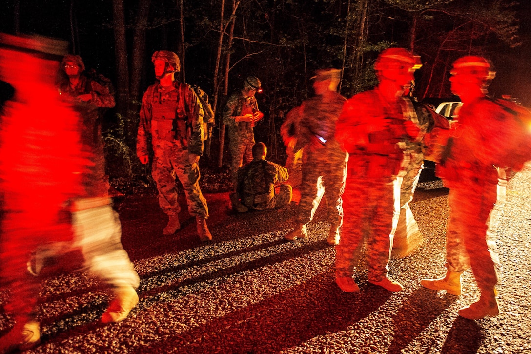 Soldiers participate in a 12 mile ruck march at McCrady Training Center in Eastover, S.C. April 5, 2016. South Carolina Air National Guard photo by Tech. Sgt. Jorge Intriago
