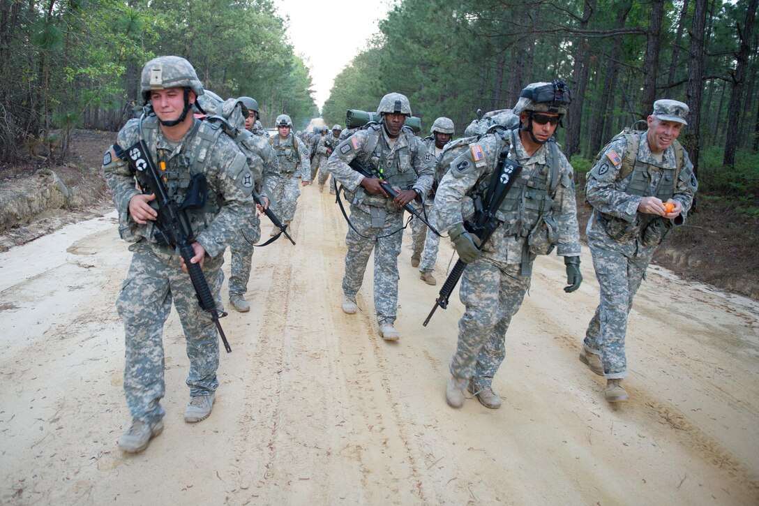 Soldiers participate in a 12 mile ruck march at McCrady Training Center in Eastover, S.C. April 5, 2016. South Carolina Air National Guard photo by Tech. Sgt. Jorge Intriago