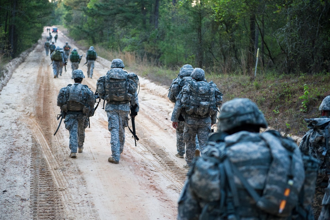 Soldiers near the end of a 12 mile ruck march at McCrady Training Center in Eastover, S.C. April 5, 2016. South Carolina Air National Guard photo by Tech. Sgt. Jorge Intriago