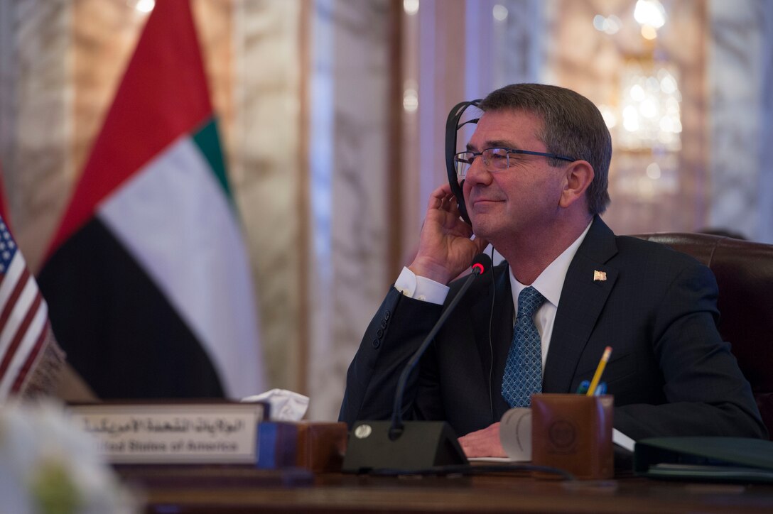 Defense Secretary Ash Carter uses a headset to listen to translation during the U.S.-Gulf Cooperation Council Summit in Riyadh, Saudi Arabia, April 20, 2016. Carter is visiting Saudi Arabia to help accelerate the lasting defeat of the Islamic State of Iraq and the Levant and participate in the U.S.-GCC Summit. DoD photo by Air Force Senior Master Sgt. Adrian Cadiz