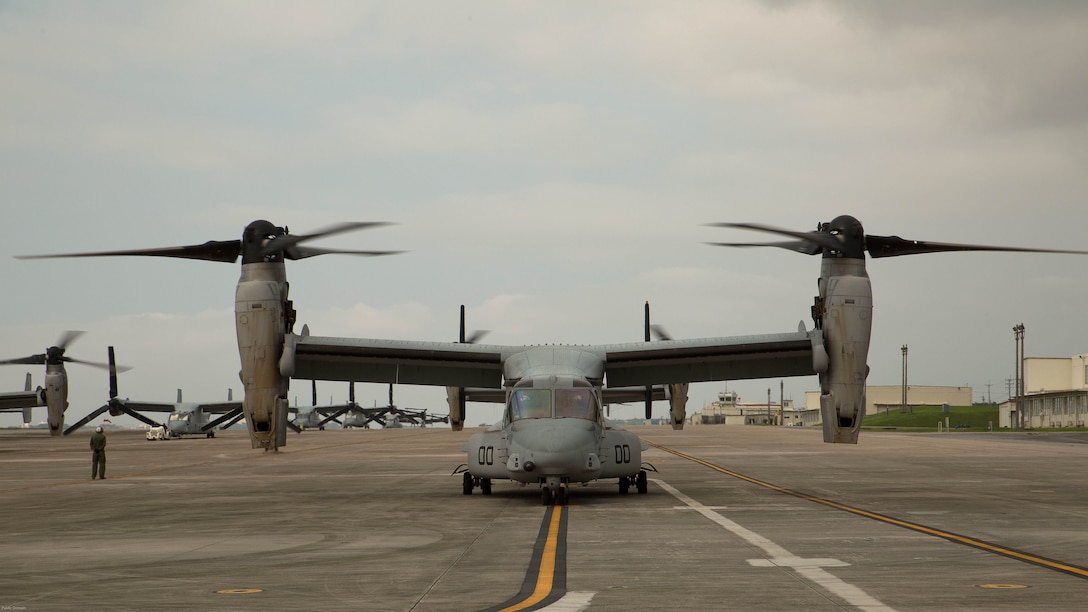 MV-22 Ospreys with Marine Medium Tiltrotor Squadron 265, 31st Marine Expeditionary Unit, await the green light for takeoff April 17, 2016 on Marine Corps Air Station Futenma, Japan. United States Forces, Japan is providing operational airlift support in coordination with the Government of Japan’s efforts to provide relief following the devastating earthquake near Kumamoto. 