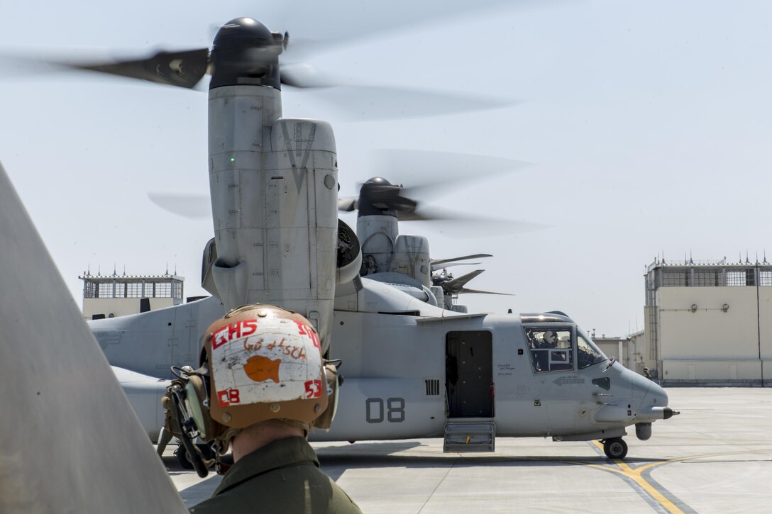 Marines refuel and prepare MV-22B Osprey aircraft before takeoff at Marine Corps Air Station Iwakuni, Japan, April 20, 2016. The Marines, assigned to Marine Medium Tiltrotor Squadron 265 Reinforced, 31st Marine Expeditionary Unit, are supporting relief efforts following devastating earthquakes near Kumamoto. Marine Corps photo by Lance Cpl. Aaron Henson