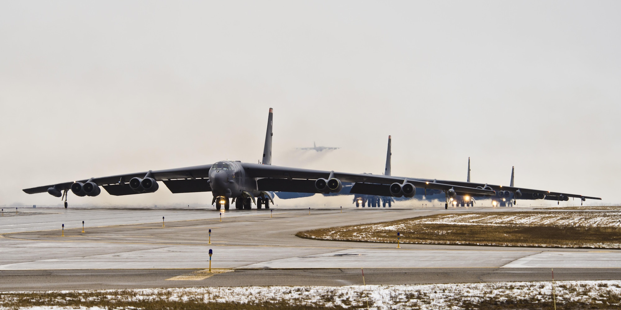 B-52H Stratofortresses taxi on the runway during Exercise Constant Vigilance at Minot Air Force Base, N.D., April 17, 2016. Air Force Global Strike Command conducts training operations and exercises on a regular basis to ensure our forces are ready to perform nuclear deterrence operations and long-range strike missions if and when called upon to do so. (U.S. Air Force photo/Airman 1st Class J.T. Armstrong)