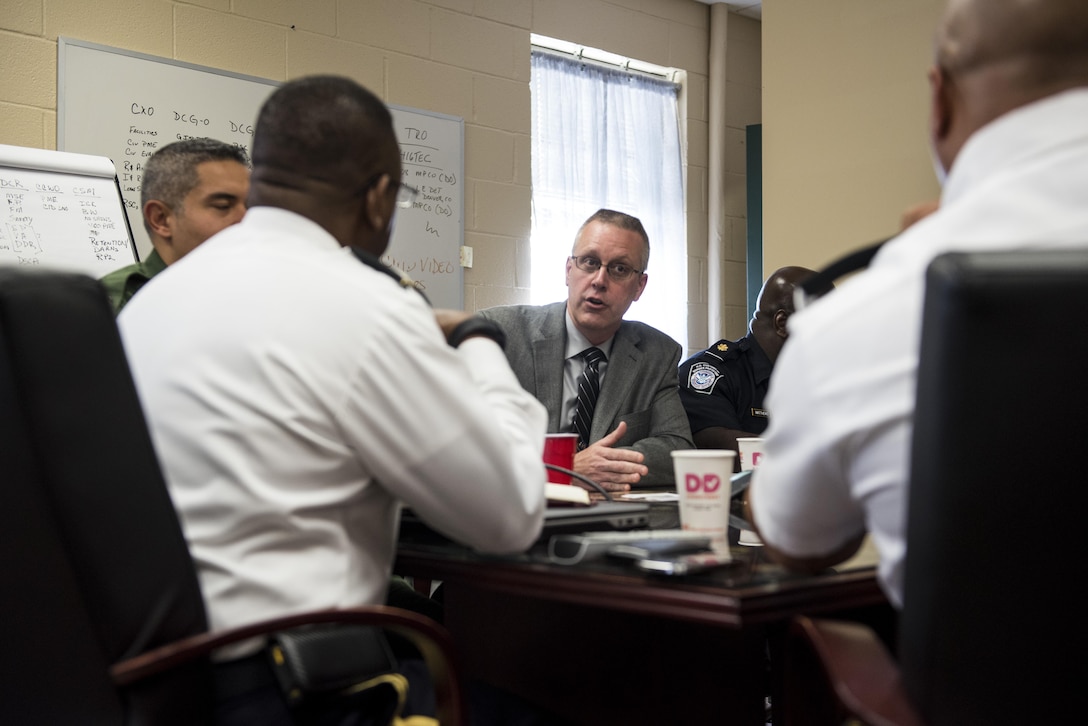 Kevin Cannon, Department of Defense liaison for the U.S. Department of Homeland Security, meets with U.S. Army Reserve and 200th Military Police Command leadership to discuss career opportunities availble to Army Reserve military police in the Customs and Border Protection during a gathering at Fort Meade, Maryland, April 15. (U.S. Army photo by Master Sgt. Michel Sauret)